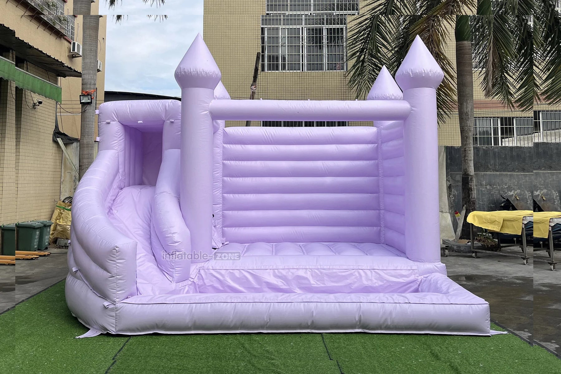 Unleashing Romance and Fun: The Purple Bounce House Slide Combo for Your Wedding Party