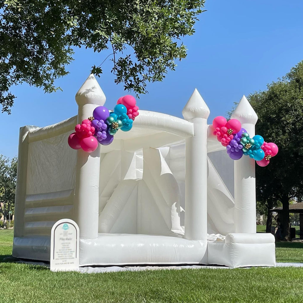 Add Excitement to Your Party with a White Bounce House with Slide from Inflatable-Zone