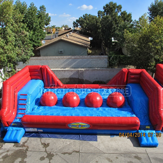 Conquer the challenge with our Big Balls Wipeout Run Inflatable Obstacle Course! Inspired by the popular TV show, this inflatable course features giant balls to leap across, providing an exhilarating experience for participants. Perfect for events or team-building activities, it's sure to bring laughter and excitement to all who dare to tackle it!