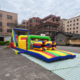 Amp up the fun with our Blow Up Slide Obstacle Course! This large inflatable assault course combines thrilling slides with challenging obstacles, perfect for creating excitement at any event. Ideal for parties, school events, and community gatherings, it offers hours of engaging play. Available for rent, it’s easy to set up and provides a memorable experience for all ages. Bring dynamic adventure to your next event with this impressive inflatable obstacle course!
