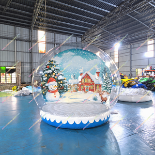 Make your events magical with the Christmas Tree Snow Globe Clear Inflatable Dome Tent! Perfect for weddings, photo booths, or holiday rentals, this spacious snow globe features a charming snowman and tree for unforgettable moments. Easy to set up, durable, and ideal for winter-themed celebrations!