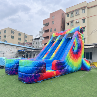 Take outdoor fun to new heights with our Commercial Inflatable Double Slide! This giant inflatable dry slide is perfect for kids' parties and events. Watch as they slide and glide down this exciting attraction, creating unforgettable memories of laughter and joy!