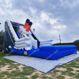 Make a splash with our Commercial Titanic Inflatable Water Slide! This blow-up double water slide guarantees double the fun, with a thrilling ride down into a refreshing inflatable pool. Perfect for parties, events, or backyard fun, it's sure to be the highlight of any summer gathering. Dive into excitement and cool off in style with this epic inflatable water slide!