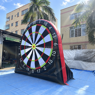 Kick up the fun with our Foot Darts Inflatable! Combining soccer and darts, this giant inflatable game is perfect for parties, events, or rentals. Easy to set up and loads of fun, players kick soccer balls to hit the giant dartboard. Ideal for all ages, add some excitement to your next event!