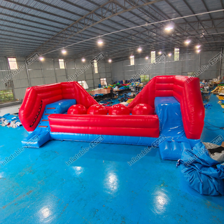 Challenge yourself with our Inflatable Big Balls Wipeout Run! This sports game features an inflatable obstacle course with big balls to navigate through. Test your agility and endurance as you race against friends and family to conquer the course. Bring the excitement of the hit TV show Wipeout to your event and create unforgettable memories with this thrilling inflatable attraction!