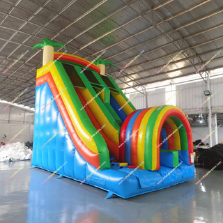 Add vibrant fun to any space with this Inflatable Funny Rainbow Slide! Featuring colorful arches, a large sliding area, and playful palm tree decor, it's perfect indoor playground equipment for home use. Kids will love the bright design and endless active playtime on this durable, fun slide.