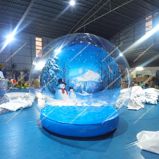 Draw attention this holiday season with our Inflatable Snowman in a Snow Globe! This eye-catching Christmas decoration is perfect for advertising, parties, or outdoor displays. Featuring a friendly snowman inside a classic snow globe, it adds a festive touch to any setting and creates a joyful holiday atmosphere.