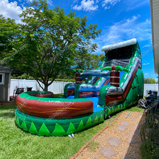 Introducing the ultimate backyard adventure: our Inflatable Water Slide Slam and Curve Double Cannon Blast! This dynamic bouncy castle slide combines thrilling curves with double cannon blast action for non-stop excitement. Perfect for summer parties or family gatherings, it's sure to be a hit with kids and adults alike. Get ready to make a splash and create unforgettable memories!
