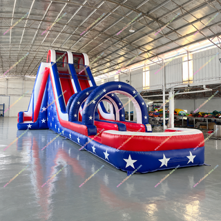 Show your patriotic spirit with our American Flag Double Lane Inflatable Waterslide! Featuring a bold arch, dual slip and slide lanes, and a splash pool, it's perfect for summer parties and events. Rent this red, white, and blue favorite near you for nonstop water fun and excitement!