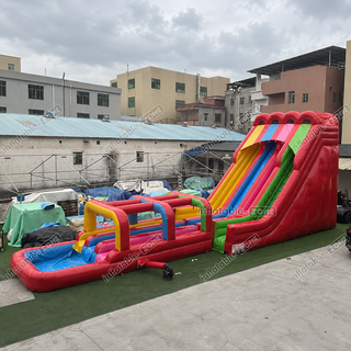 Make a splash with our Large Outdoor Water Slide Jumping Castle! Featuring an inflatable pool and thrilling obstacles, this water slide is perfect for kids' summer fun. Watch as they slide, splash, and laugh their way through endless hours of excitement!