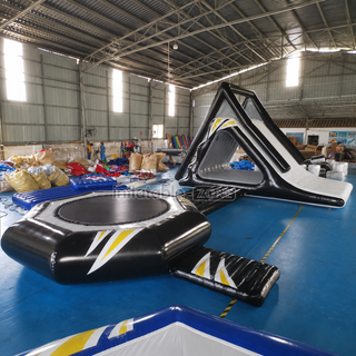 Experience endless fun on the water with our New Black Inflatable Water Floating Trampoline Combo! Featuring a built-in launch and slide, it's perfect for thrill-seekers of all ages. Jump, slide, and splash your way to unforgettable summer adventures. Get yours now!