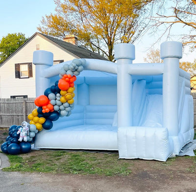 Pastel blue inflatable bounce house with slide combo for party events