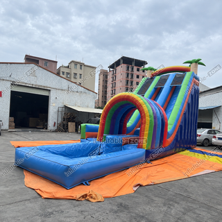 Brighten up your backyard with the Rainbow Double Splash Water Slides! This fun inflatable jumping castle features two vibrant water slides and a spacious pool for cooling off. Perfect for large gatherings, it’s designed to provide hours of laughter and excitement. Durable and easy to set up, it’s the ultimate addition to any pool party or summer adventure. Slide into fun!