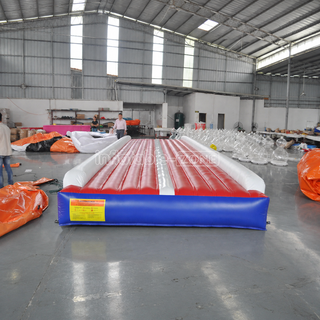 Get ready to elevate your skills with our Tumble Track Trampoline Air Trampoline Track! Perfect for gymnasts and athletes, this inflatable track offers a safe and dynamic surface for practicing flips, tricks, and jumps. With its durable construction and bounce-enhancing design, it's the ultimate tool for honing your skills and achieving new heights. Step onto the track and soar with confidence!