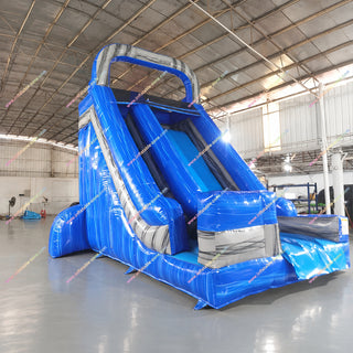 Blue commercial inflatable slide in a factory