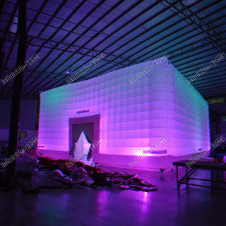 LED illuminated inflatable cube event tent in a factory