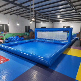 Blue inflatable volleyball pool court in a factory